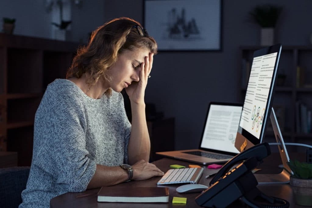 woman-at-computer-with-burnout